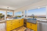 Range and Kitchen sink with views